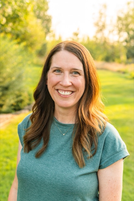 Melodie Henderson smiling outdoors